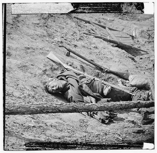 Petersburg, Va. Dead Confederate soldier with gun. Library of Congress. 