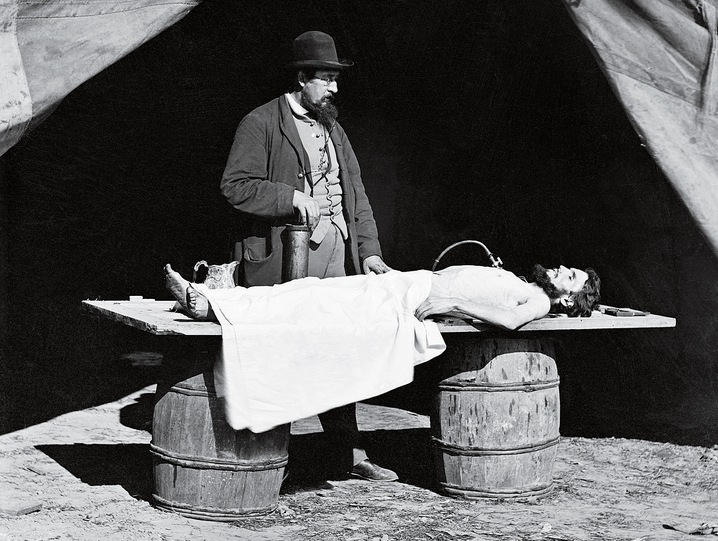 In this undated photo, Dr. Richard Burr, an embalming surgeon, prepares a body for the preservation process -Library of Congress