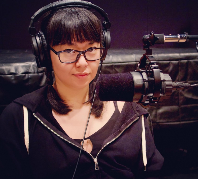 Photo of Louise Hung in the podcast recording room.
