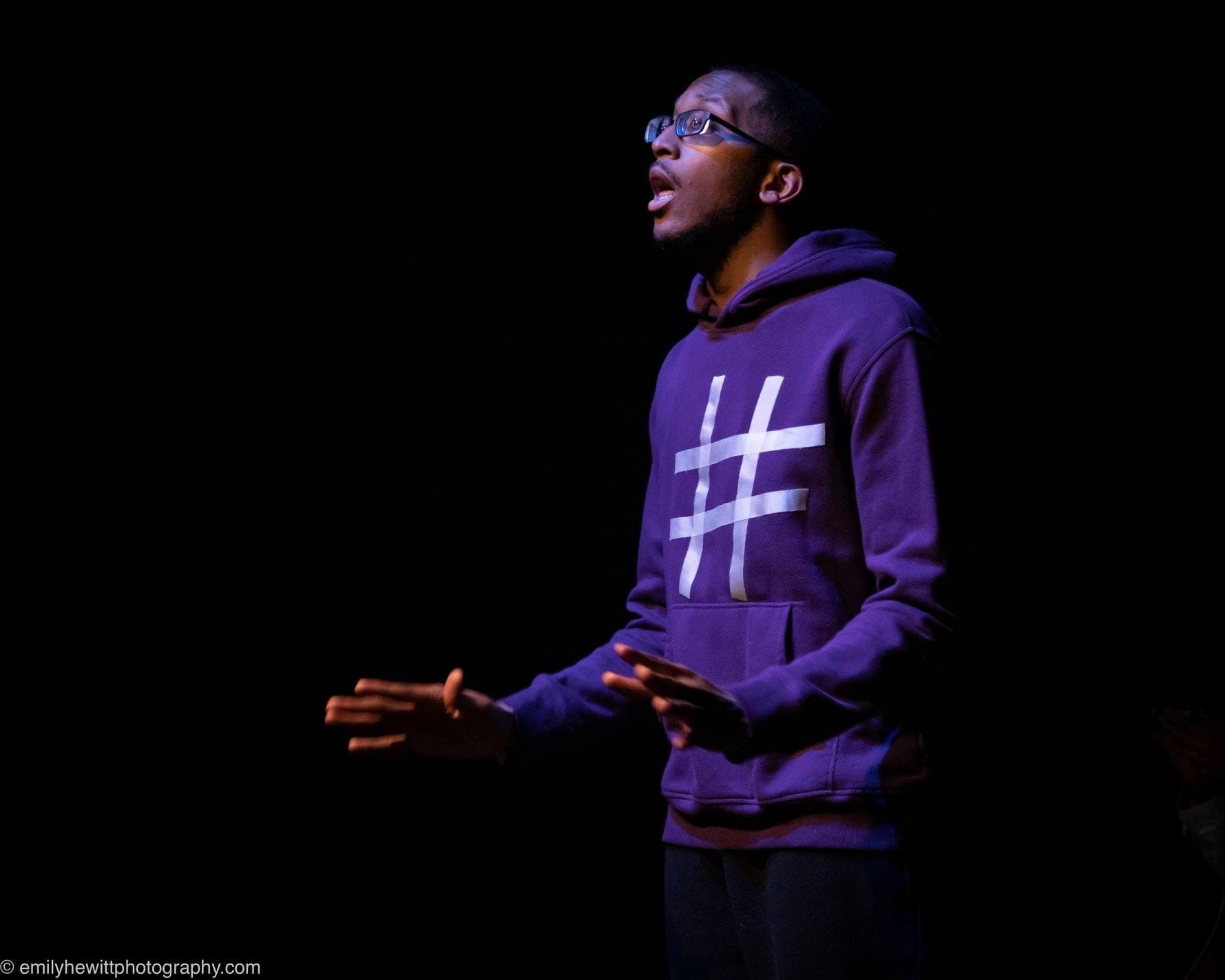 Black man acting in dramatic lighting