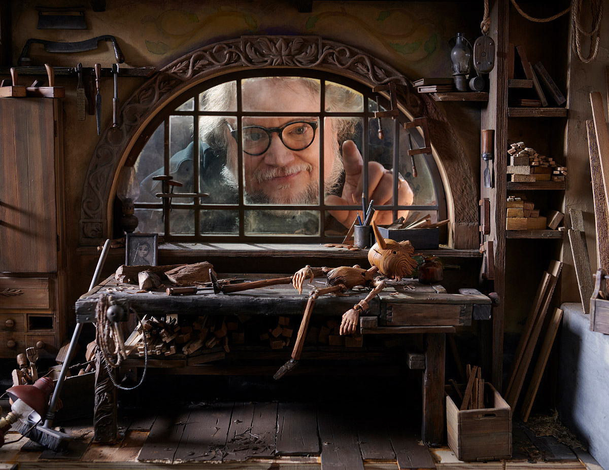 Filmmaker Del Toro peers through a window into the small set of Gepetto's workroom in his new version of the classic Pinnocchio tale.