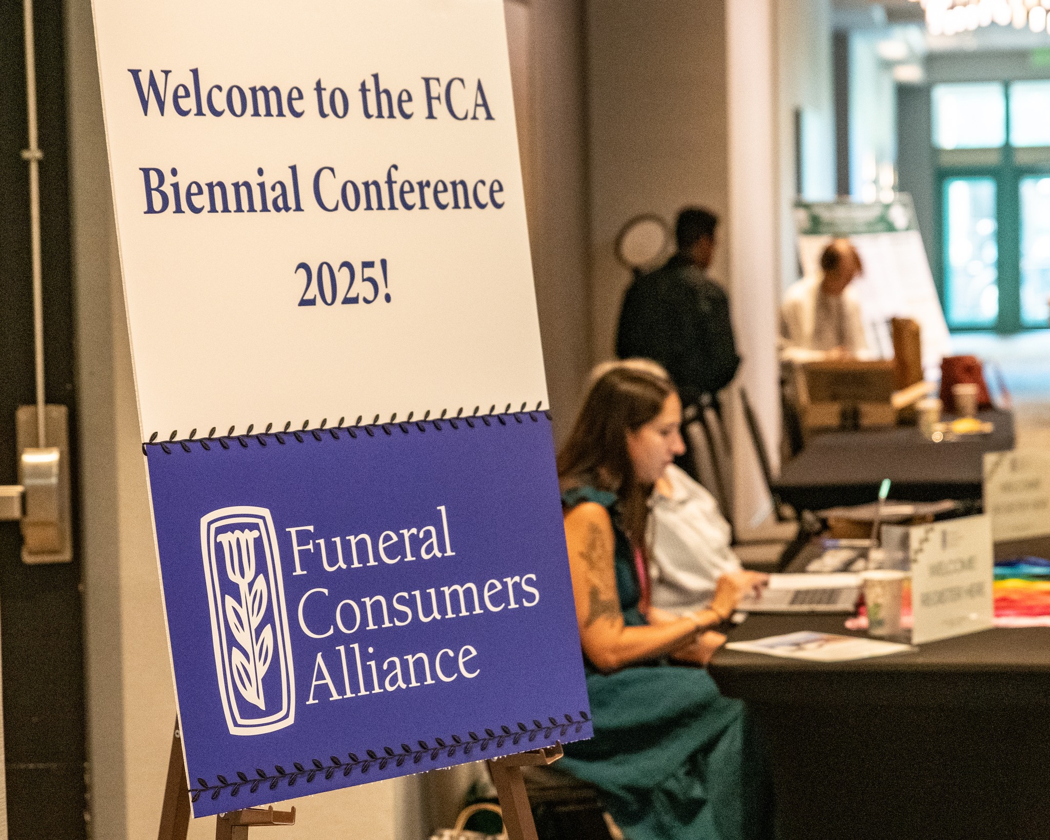 photograph of conference sign at funeral consumers alliance conference