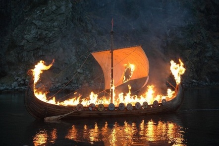 Photo of a viking ship on fire