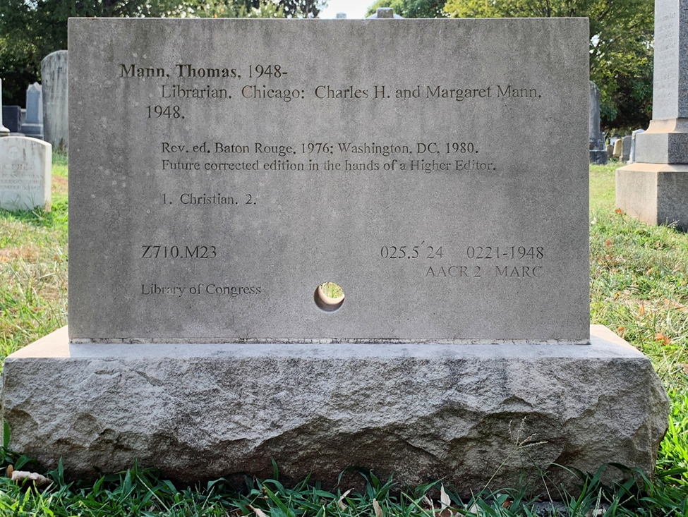 Photo of a grave marker known as the card catalog grave